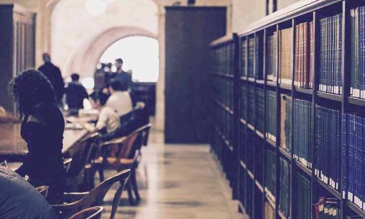 students at school library