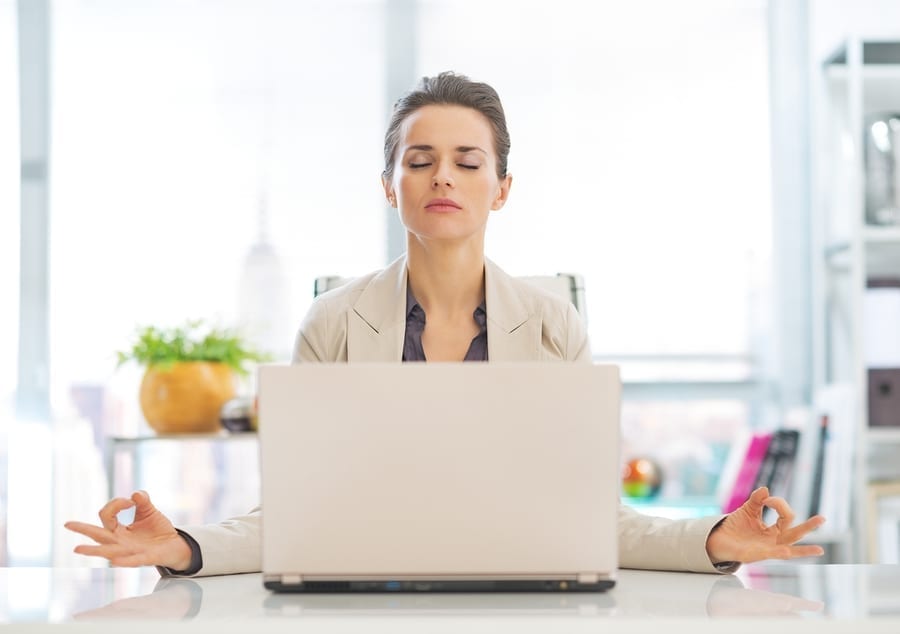 bigstock Business Woman Meditating Near 68343058