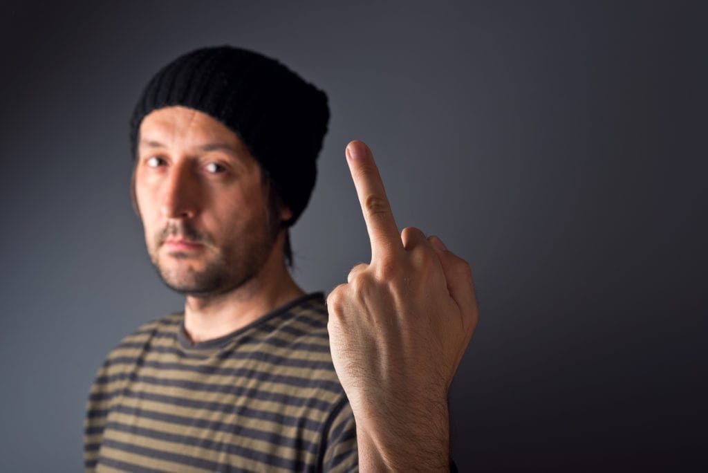 Man giving the finger during argument